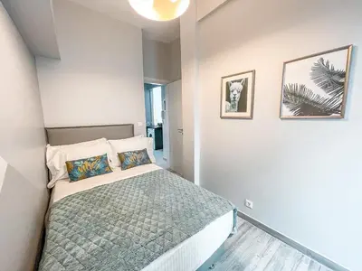 a bedroom with a bed in a room at Luxury apartment close to metro & Akropolis- Cielo Homes in Athens