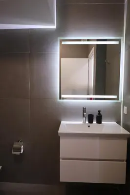 a bathroom with a white sink and a mirror at Synathens II - Apartments & Studios in Athens
