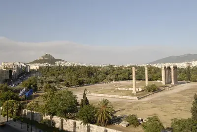 an aerial view of the city of acropolis at The Athens Gate Hotel in Athens