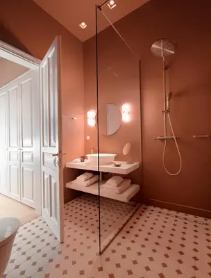 a bathroom with a shower and a sink at Monument Hotel in Athens