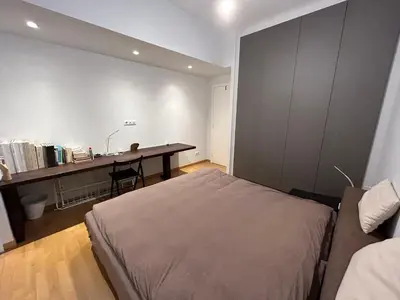 a bedroom with a bed and a desk at ATHENS SEA VIEW GUEST HOUSE in Athens