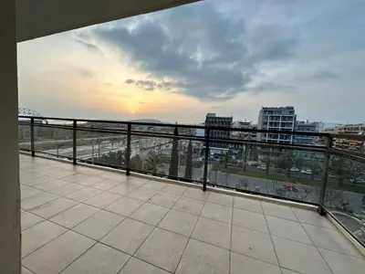 a balcony with a view of a city at ATHENS SEA VIEW GUEST HOUSE in Athens