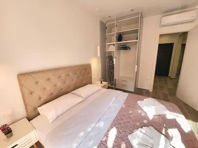 a bedroom with a large bed in a room at Nice Apartment Near Flisvos VIPGreece in Athens