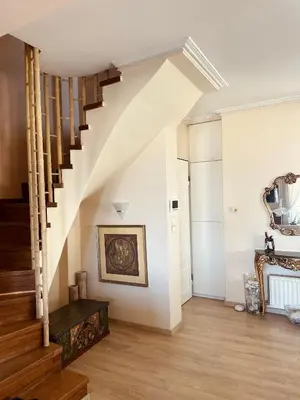 a hallway with a staircase in a house at Sea View House Voula in Athens