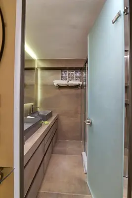 a bathroom with a shower and a sink at Farmaki Residence, Plaka in Athens