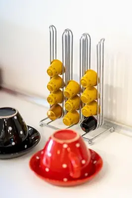 a group of yellow and red objects on a counter at Efi's DreamSpace in Athens