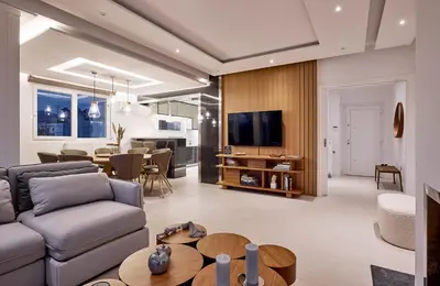a living room with a couch and a table at Elaia Luxury Selections Opal in Athens