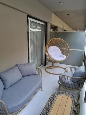 a living room with a couch and a chair at Kolonaki Upscale 4 bedroom Luxury Apartment in Athens