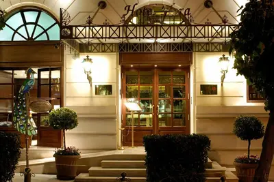 a building with a door and stairs in front at Hera Hotel in Athens