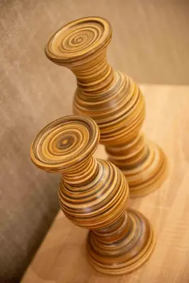 a stack of wooden spirals on a table at DIMANTHEO in Athens