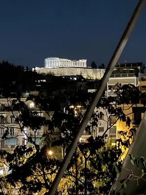 a view of the acropolis at night at DIMANTHEO in Athens