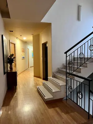 a hallway with a staircase in a house at Art Hotel Athens in Athens