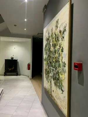 a painting hanging on a wall in a room at Art Hotel Athens in Athens