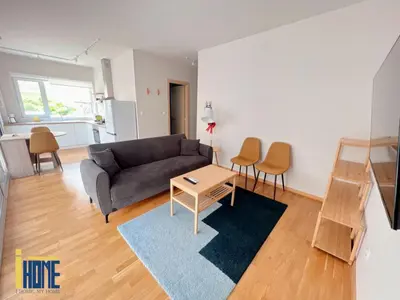 a living room with a couch and a table at Skiathou 12 Contemporary Residences in Athens