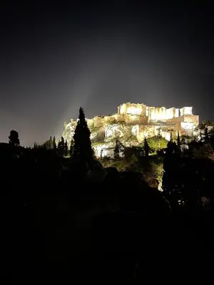 a view of the acropolis lit up at night at Acropolis selected apartment in Athens