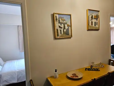 a room with a table with a bowl of food on it at F23 in Athens