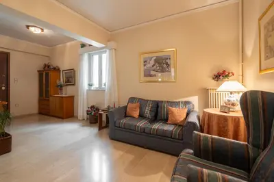 a living room with a couch and a table at 2 BR Apartment 5 minutes to Thissio Metro & Acropolis in Athens