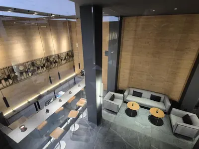 an overhead view of a lobby with couches and a table at Alassia Hotel in Athens