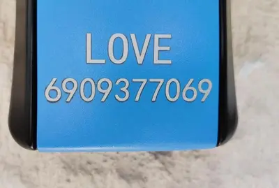a blue sign with the word love on it at A comfortable apartment to you in Athens