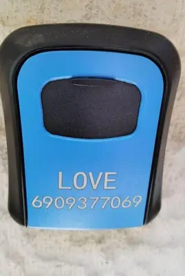 a small blue object with the words love andonispects at A comfortable apartment to you in Athens