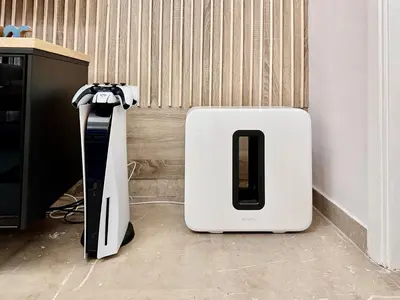 a video game system sitting on the floor next to a wall at Elaia Luxury Selections Sapphire in Athens