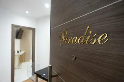 a wooden door with the word orange written on it at Paradise Syntagma Family Apartment in Athens