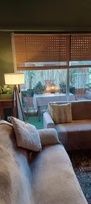 a living room with two couches and a table at 115m2 K.G HOME in Athens