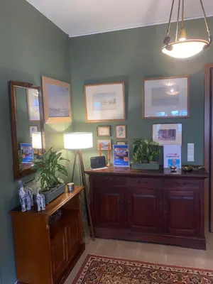 a room with a desk with plants on it at 115m2 K.G HOME in Athens