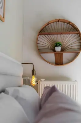a bedroom with a mirror and a bed at Sunny & Modern apt for 3 persons in Athens