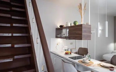 a kitchen with a sink and a table in a room at Olvar Penthouse Apartment in Athens