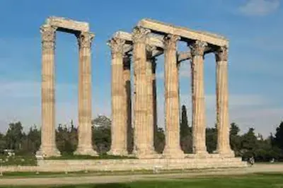 a group of tall columns in front of a building at Acropolis Museum Grand Residence in Athens