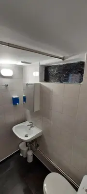 a bathroom with a sink and a toilet at HoneyBee 3 - Cozy studio in the center of Athens in Athens