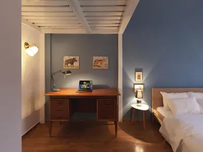 a bedroom with a desk next to a bed at Fyllis17 - Cozy apartment in the heart of Athens in Athens