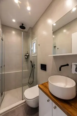 a bathroom with a toilet and a sink and a shower at Modern studio apartment B in Athens
