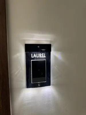 a lightswitch on the wall of a hotel room at TiP - ToP Suites in Athens