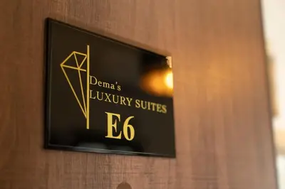 a sign on a door that reads danzas luxury suites at Dema Luxury Suites - Perikleous E6 in Athens