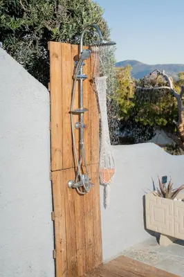 a net hanging on the side of a wall at Be Home Sea View in Porto Rafti