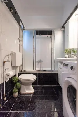 a bathroom with a toilet and a shower and a sink at Blue Ark Wanderlust in Athens