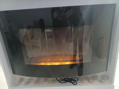a reflection of a person standing in an oven at Cozy Renovated Apartment in Athens