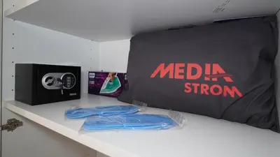 a shelf with a bed with a mexia sign and a pillow at City Break Metro Ambelokipi in Athens