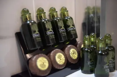 a group of bottles of wine on a shelf at Cozy flat 5min to subway station (EPIDAMN) in Athens