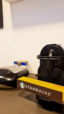 a starbucks box sitting on top of a table at Chic apt near Acropolis - Avdi square in Athens