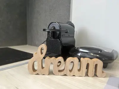 a wooden sign that says camera next to a camera at Stylish and central apt near Acropolis - Avdi square in Athens