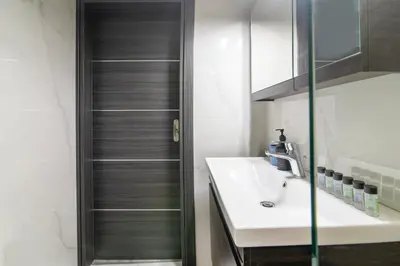a bathroom with a sink and a shower at Luxury Studio in Athens City Center in Athens