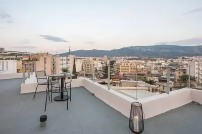 a balcony with a view of a city at City-View Penthouse at Panormou in Athens