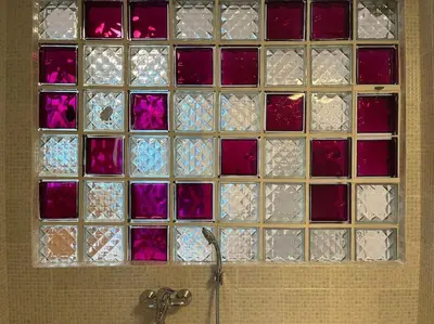 a bunch of glass tiles on a wall at Cute apartment at the foot of lycabettus hill in Athens