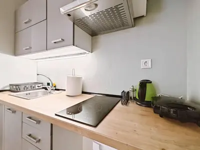 a kitchen with a sink and a counter top at 5min Metro, Sotiria, Iatriko, Semi-Basement in Athens