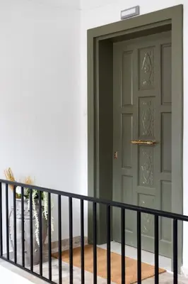 a door on a building next to a balcony at Queen's stone legend, royal living by Acropolis in Athens