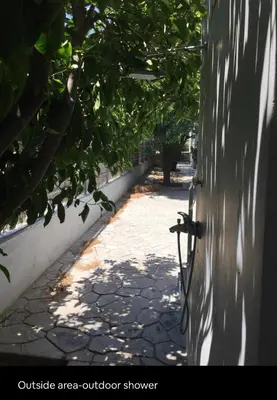 an outside area outdoor shower on a wall at Summer House / Πόρτο Ράφτη in Porto Rafti