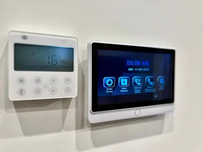 a ipod is hooked up to a digital clock at T&T Luxury Apartments - Rooftop Jacuzzi in Athens